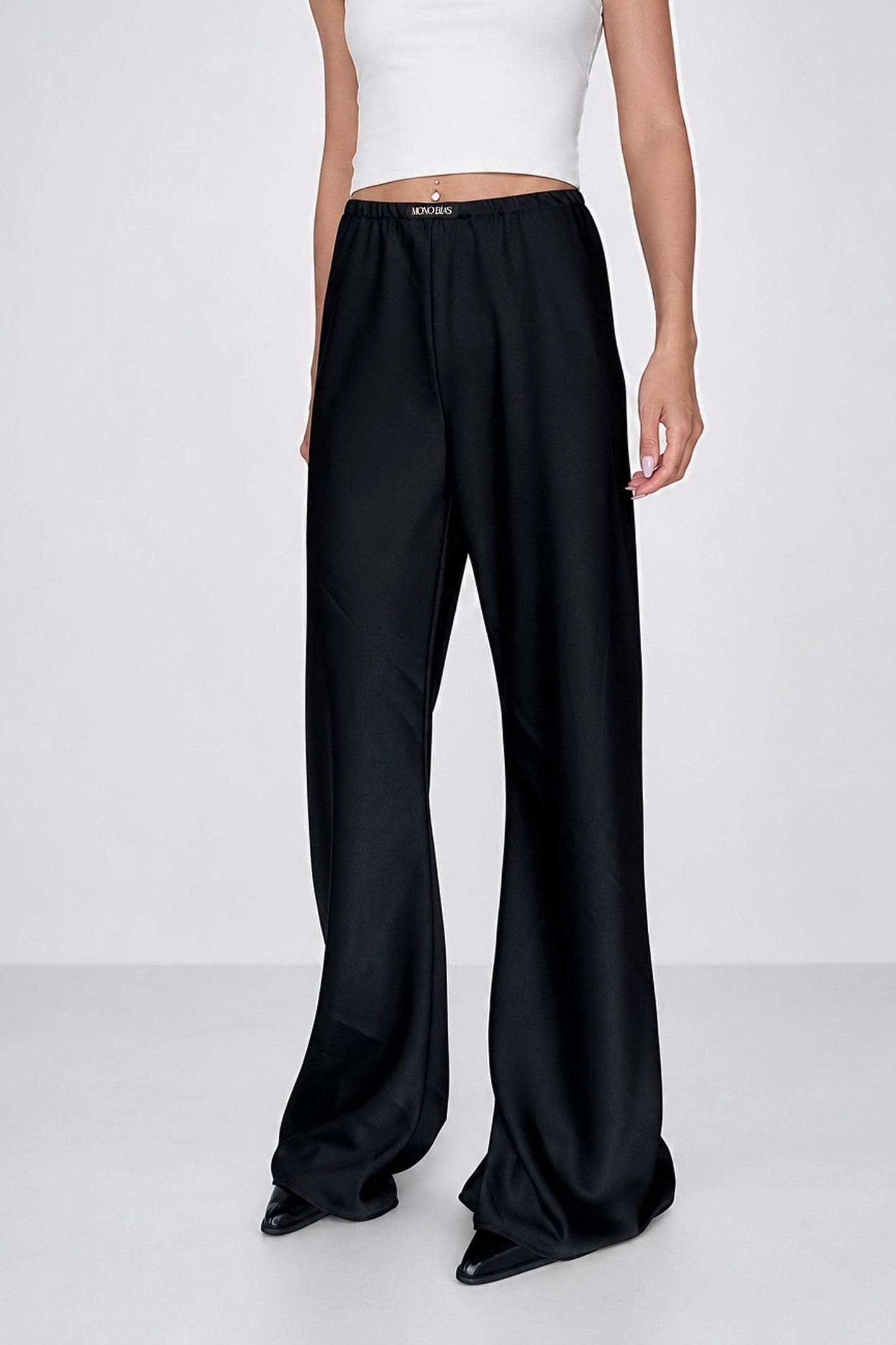 Serenade Bias Cut Flared Pants In Black Satin